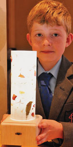 Nine-year-old Thomas Granig received R10 000 for the Most Promising Young Designer award with his LED Envirolight.